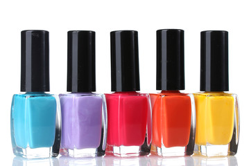 Group of bright nail polishes isolated on white