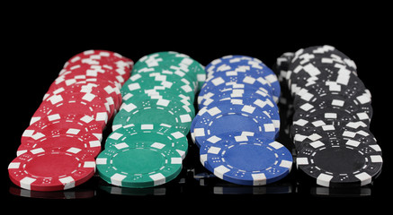 Casino chips isolated on black