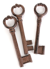 a bunch of antique keys isolated on white