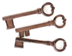 a bunch of antique keys isolated on white