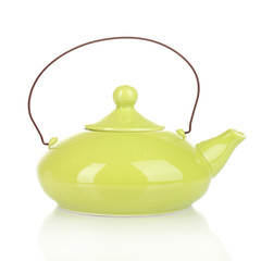 Green teapot isolated on white