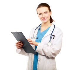 Smiling young doctor in white coat standing
