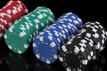 Casino chips isolated on black