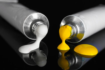 White and yellow paints follow from the tubes