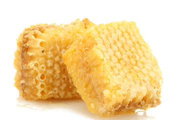 golden honeycombs isolated on white.