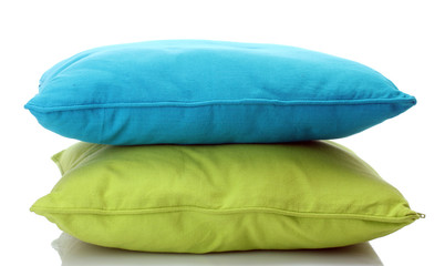 Fototapeta na wymiar bright pillows isolated on white