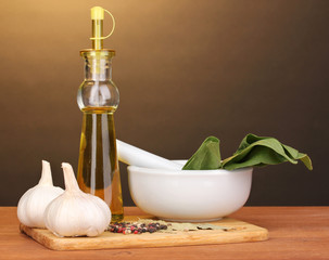 ingredients and spice on wooden table on brown background