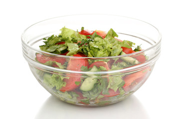 Fresh salad with tomatoes and cucumbers isolated on white