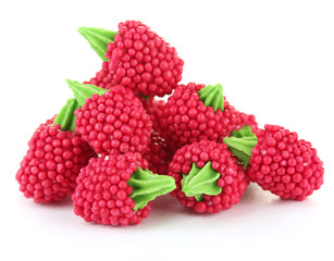 red candy raspberries isolated on white