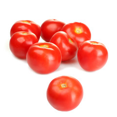 Ripe red tomatoes isolated on white