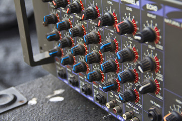 Part of an audio sound mixer with buttons 