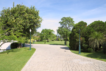 Wide path walk in public garden.