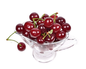 Ripe sour cherry  in a bowl, isolated on white ..