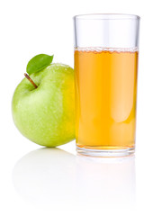 Glass of apple juice, green apples with leaves and drops of wate