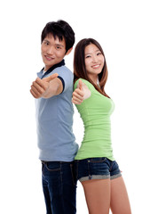 Young smiling people with thumbs up gesture on white background
