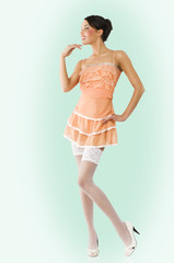 pink and white pinup she is in full-length