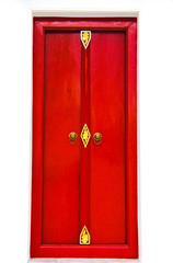 Red door in thai temple.