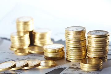 Business diagram on financial report with coins