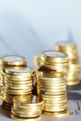 Business diagram on financial report with coins