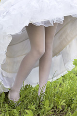 Female feet under a crinoline