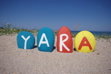 Yara, female name on colourful stones