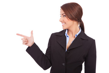 woman pointing at something interesting to her side
