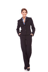 businesswoman with hands in pockets