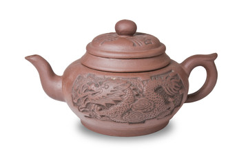 Earthenware teapot isolated on white background