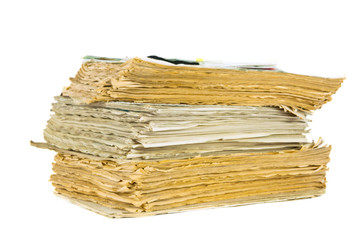 stack of old newspapers isolated