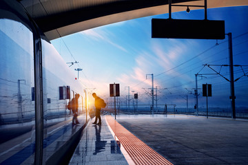 train stop at railway station with sunset - Powered by Adobe