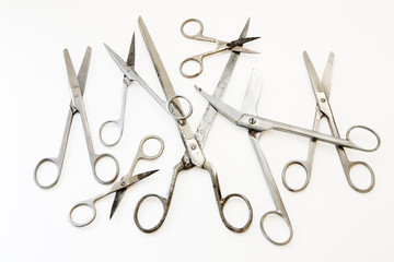 Scissors on white background
