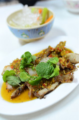Spicy salad with pork and green herb