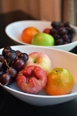 Variety of Fresh Fruits in whie bowl