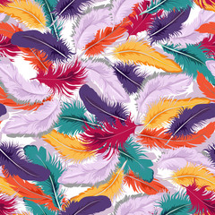 Decorative seamless background with colorful feathers.