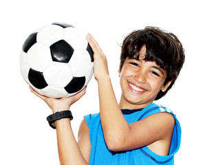 Cute boy playing football