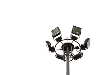 Spotlight shines light pole.