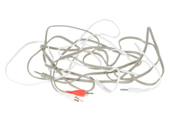 Audio and video cables isolated on white
