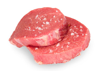 Raw beef steak over white