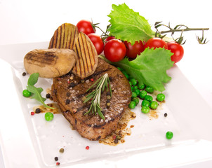 Grilled beef steak with american potatoes