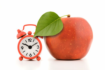 Apple with green leaf
