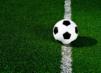 Soccer ball on green grass