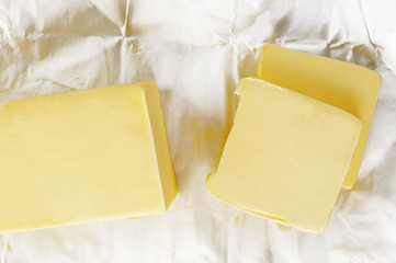 Piece of butter in paper