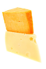 gourmet yellow cheeses  isolated over white