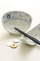 Break rice bowl and Japnese yen for economic image