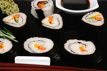 Roll with Avocado and Salmon on black