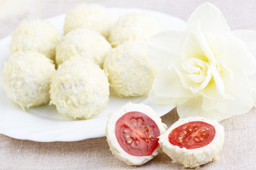 Cheese balls with a tomato cherry