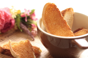 Homemade Rask with flower on background