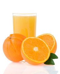 orange juice in glass and slices isolated on white