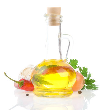 food oil and vegetable isolated on white