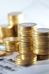 Business diagram on financial report with coins